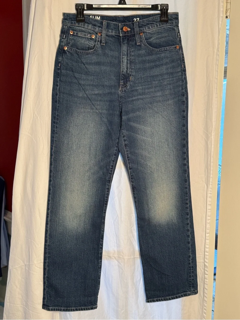 JCrew Slim Boyfriend in Mid Wash Blue. Whispering and fade. 28” inseam.